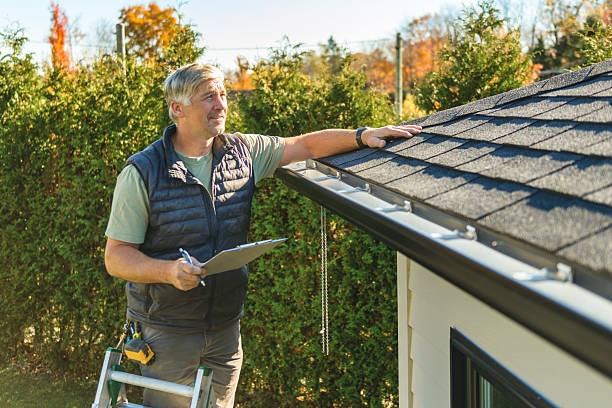Professional Roofing technician working in Waukon, IA